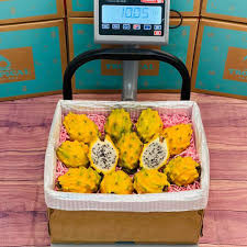 Dragon fruit basket yellow color fruits