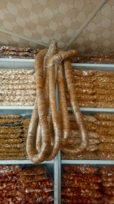figs display in dry fruit shop with dried apples 